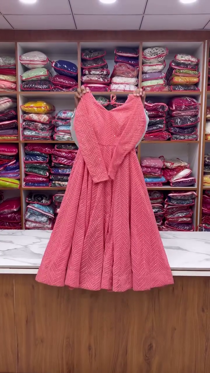 Elegant Pink Anarkali Dress with Intricate Embroidery and Flowing Dupatta for Festive Celebrations