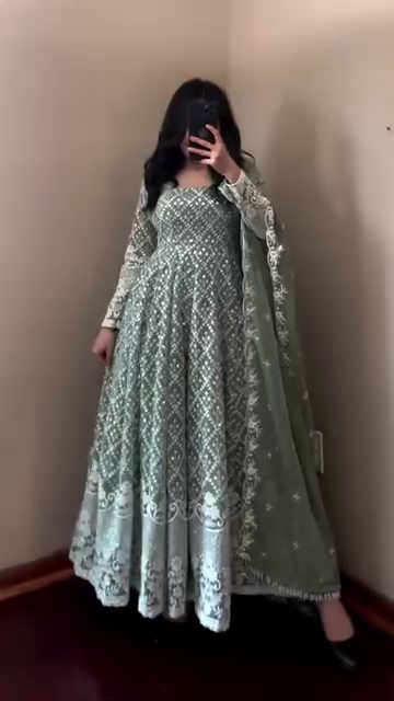 Graceful and Elegant Green Floor-Length Anarkali Dress with Intricate Silver Embroidery and Lace Detailing, Paired with a Beautiful Flowing Dupatta