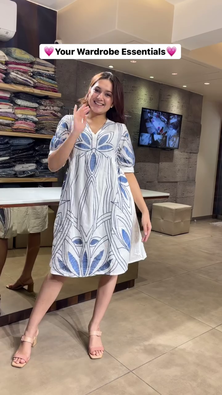 Elegant Printed Cotton Midi Dresses Featuring Artistic Floral and Geometric Motifs – Soft, Breathable Fabric with Flattering Silhouettes and Modern Necklines