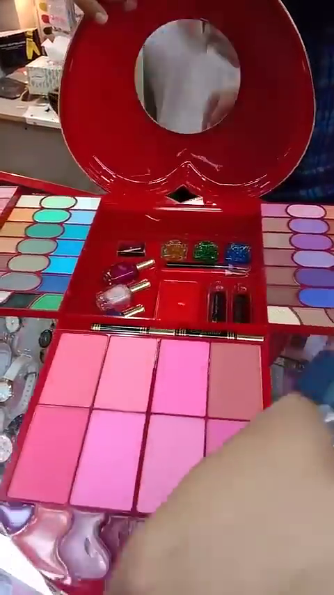 Deluxe Multi-functional Heart-shaped Makeup Kit with Eyeshadows, Lipsticks, Blushes, Nail Polishes, and Accessories for Complete Beauty Look