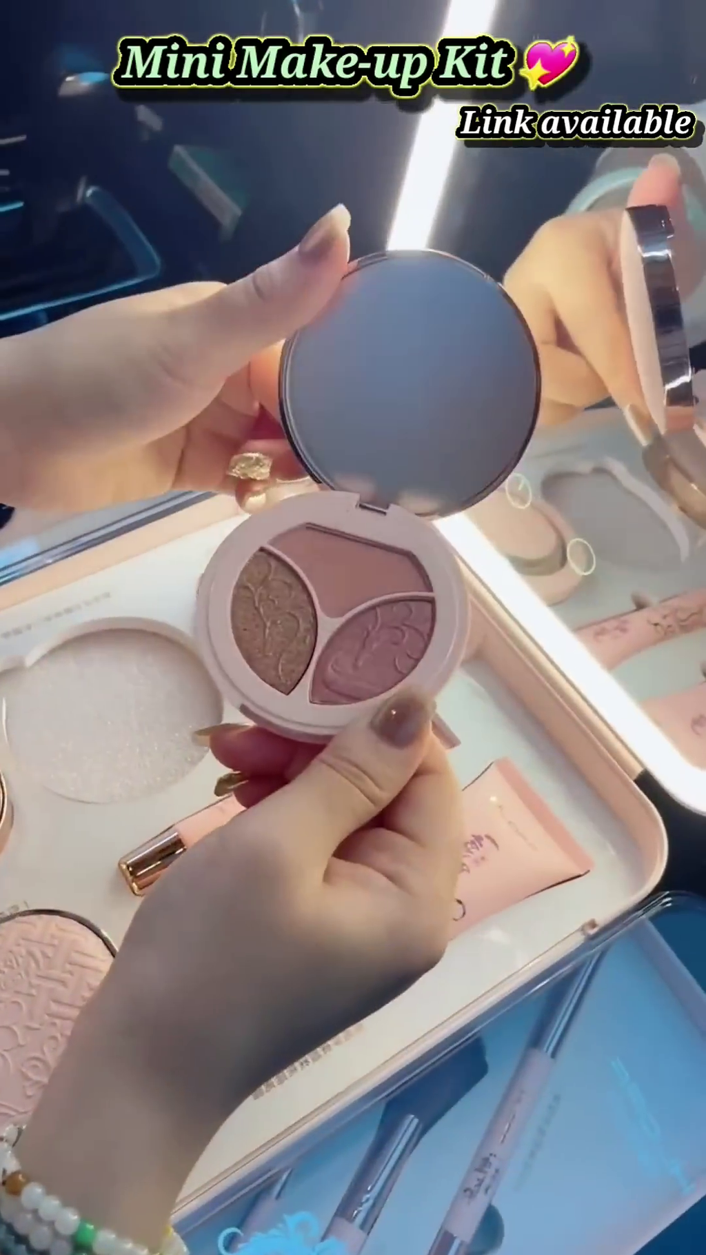 ompact Mini Makeup Kit with Built-in Mirror, Essential Cosmetics, Brushes, and Portable Design for On-the-Go Beauty Touch-Ups