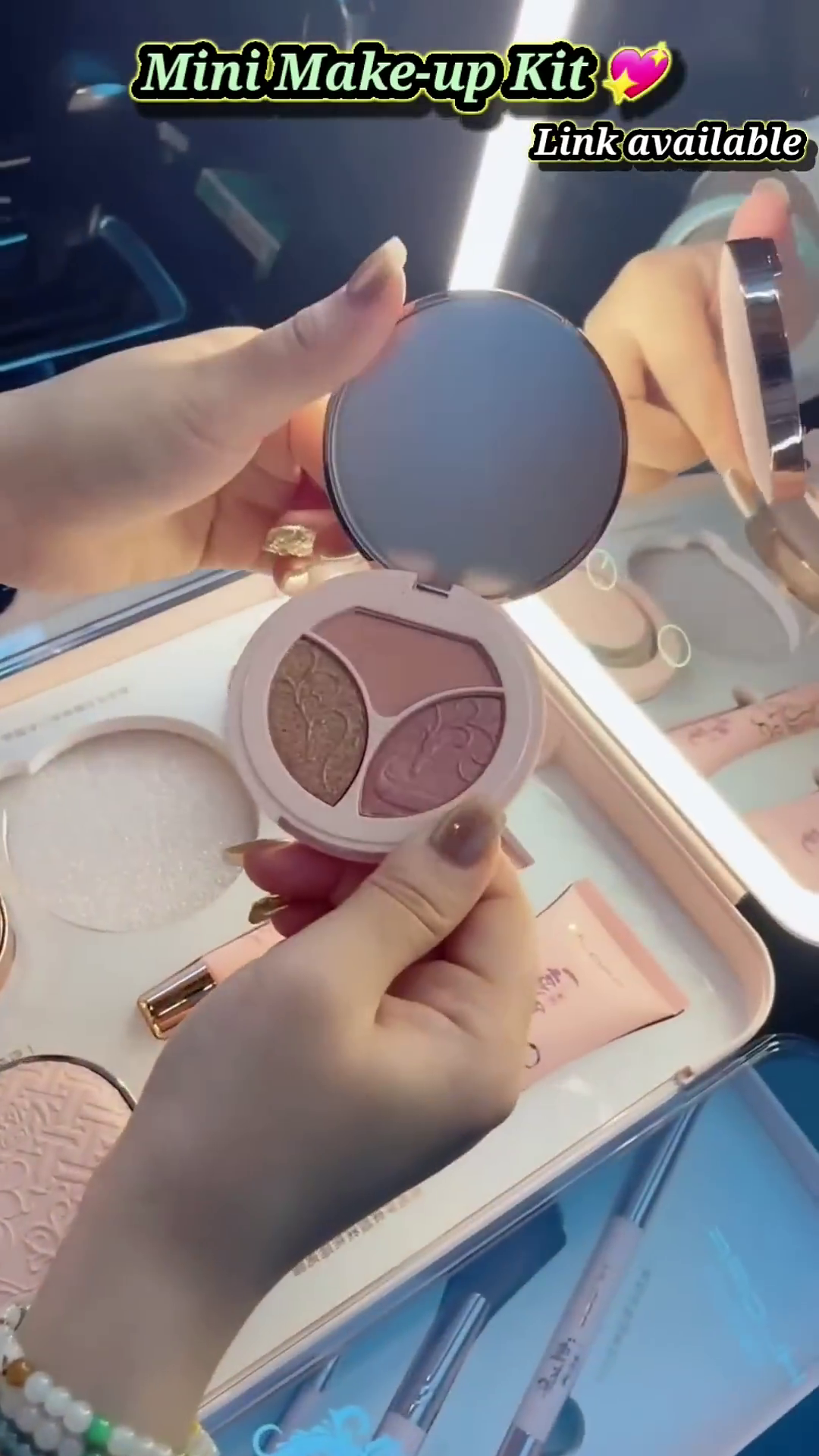 ompact Mini Makeup Kit with Built-in Mirror, Essential Cosmetics, Brushes, and Portable Design for On-the-Go Beauty Touch-Ups