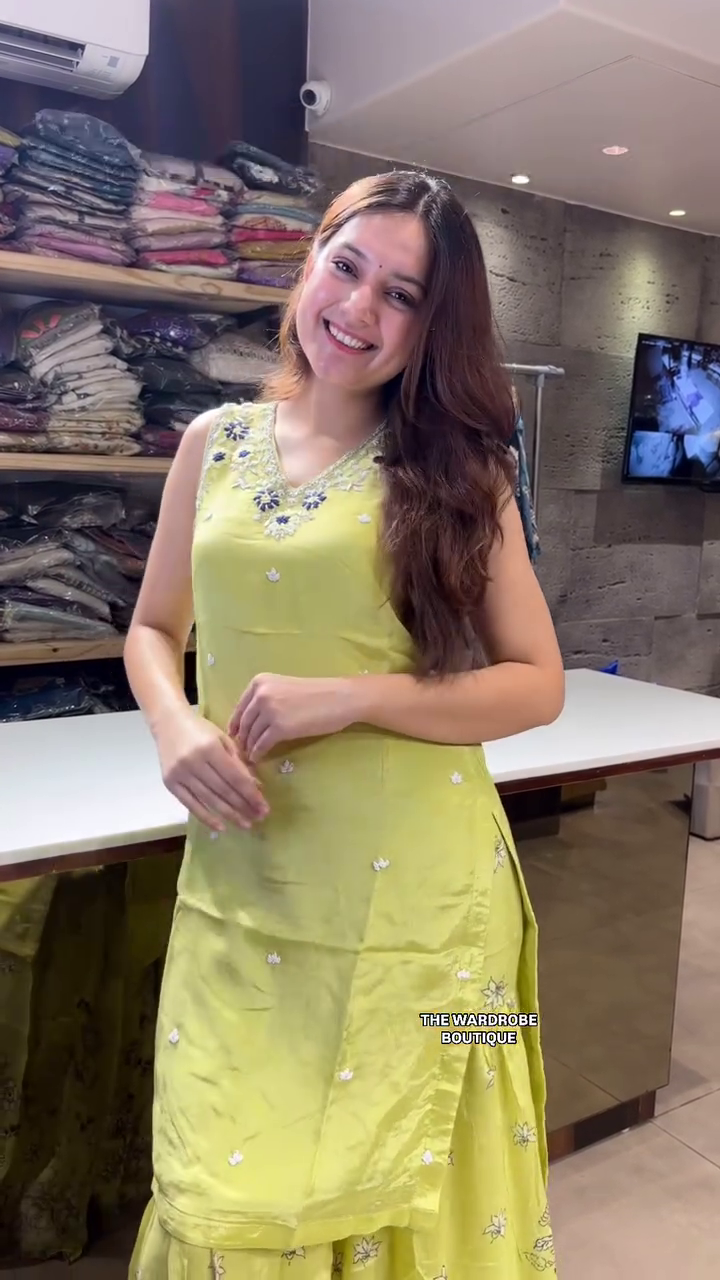 Graceful Indo-Western Ensemble Featuring an Embellished Sleeveless Kurta with Delicate Mirror Work, Paired with Flowy Floral Print Palazzo Pants and a Matching Dupatta