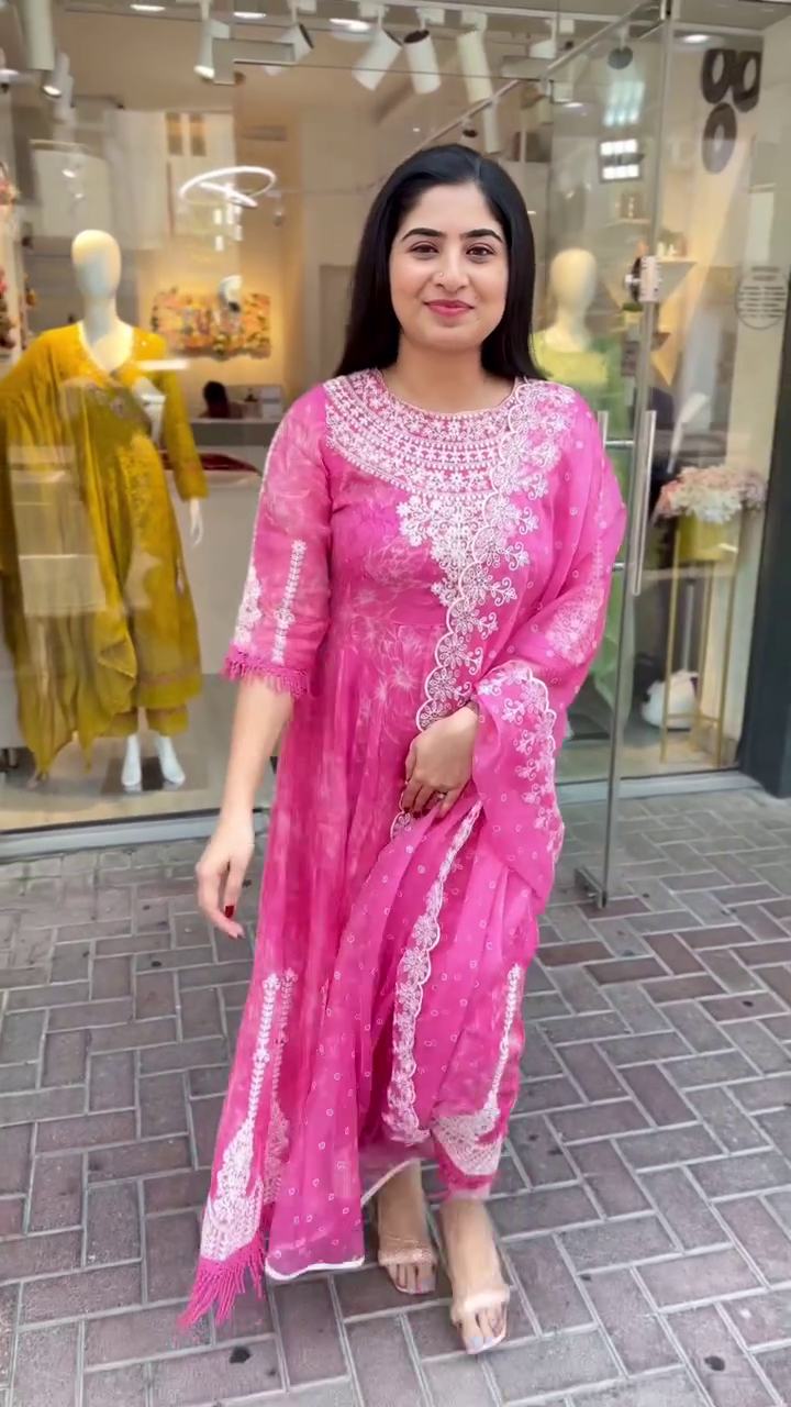 Bright Pink Anarkali Suit with Intricate White Embroidery and Net Dupatta – Perfect for Festive & Traditional Wear