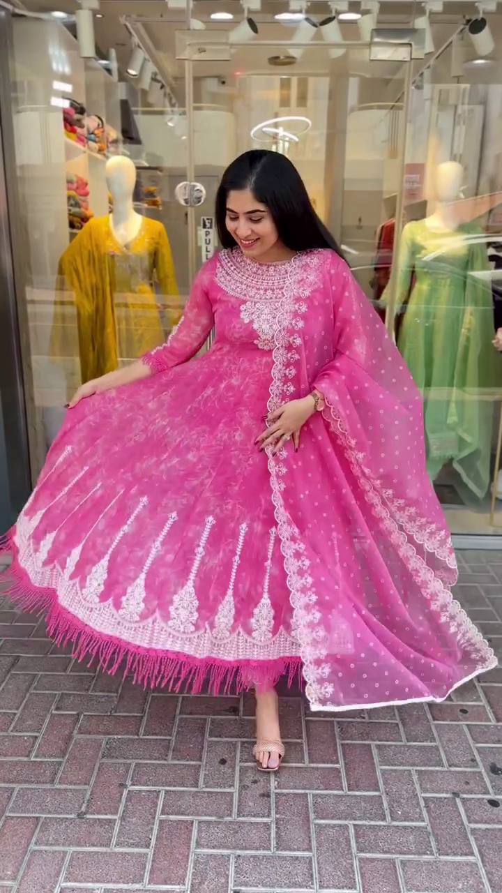 Bright Pink Anarkali Suit with Intricate White Embroidery and Net Dupatta – Perfect for Festive & Traditional Wear