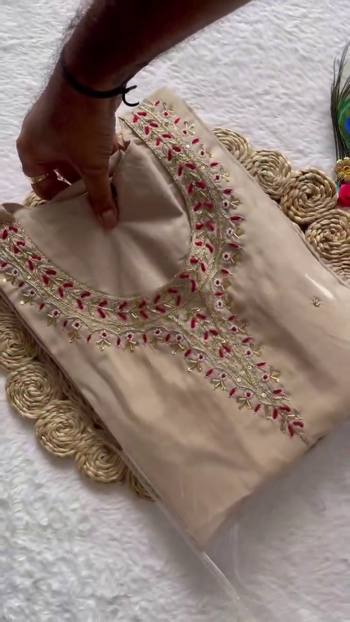 Elegant Beige Ethnic Suit Set Featuring Delicately Embroidered Neckline and Comfortable Straight Pants, Paired with a Striking Pink Dupatta Adorned with Bold Floral Prints and Rich Woven Border – Perfect for Traditional Occasions and Festive Celebrations