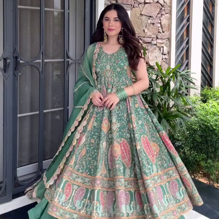 Elegant and Ethereal: Stunning Green Lehenga with Intricate Traditional Embroidery