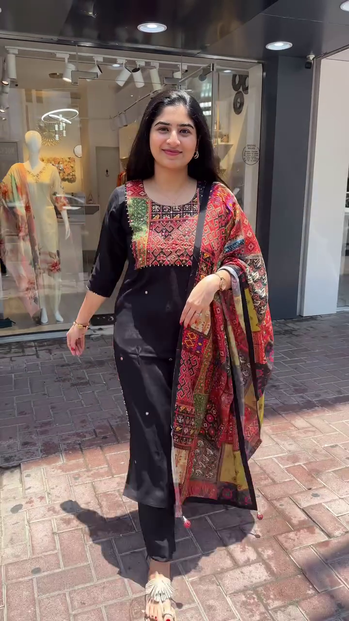 Elegant Black Straight-Cut Suit with Vibrant Multicolor Embroidered Yoke and Heavily Printed Artistic Dupatta – A Striking Blend of Classic Sophistication and Contemporary Style