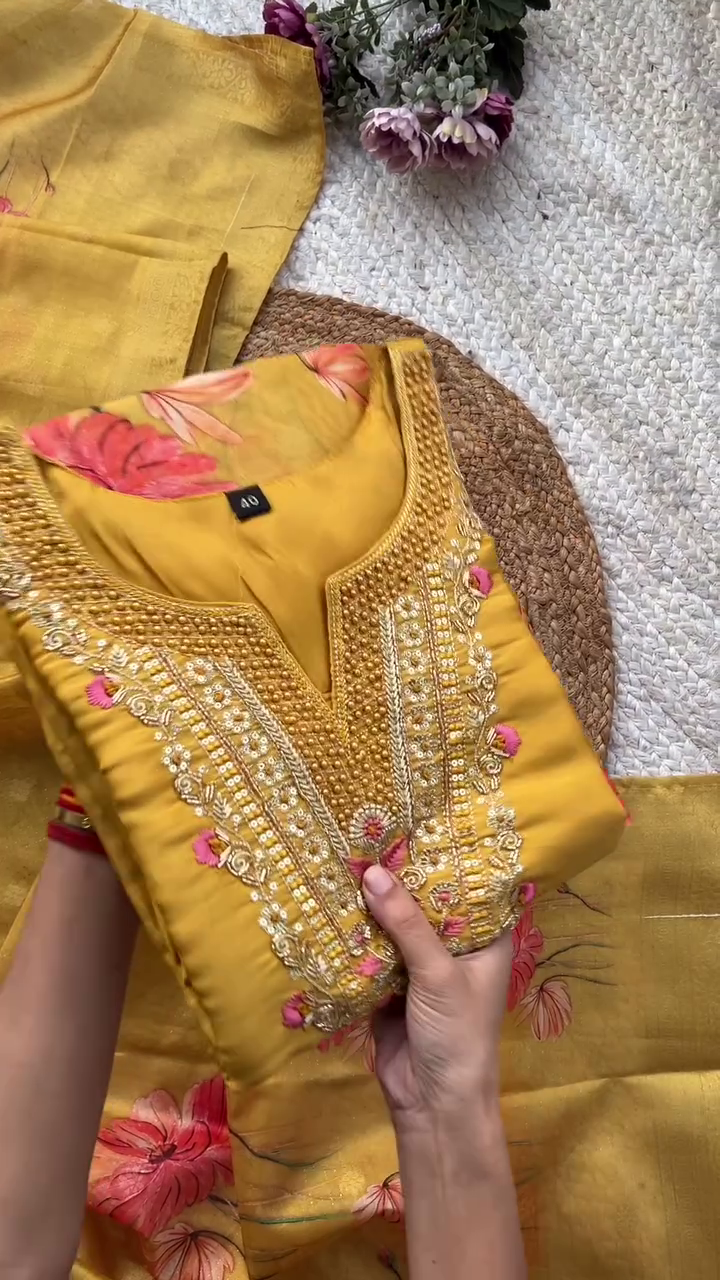 Graceful Mustard Yellow Kurta Set with Heavily Embellished Mirror and Thread Embroidery on Neckline, Paired with a Soft Silk Floral Printed Dupatta – Ideal for Festive Gatherings, Traditional Ceremonies, and Daytime Celebrations