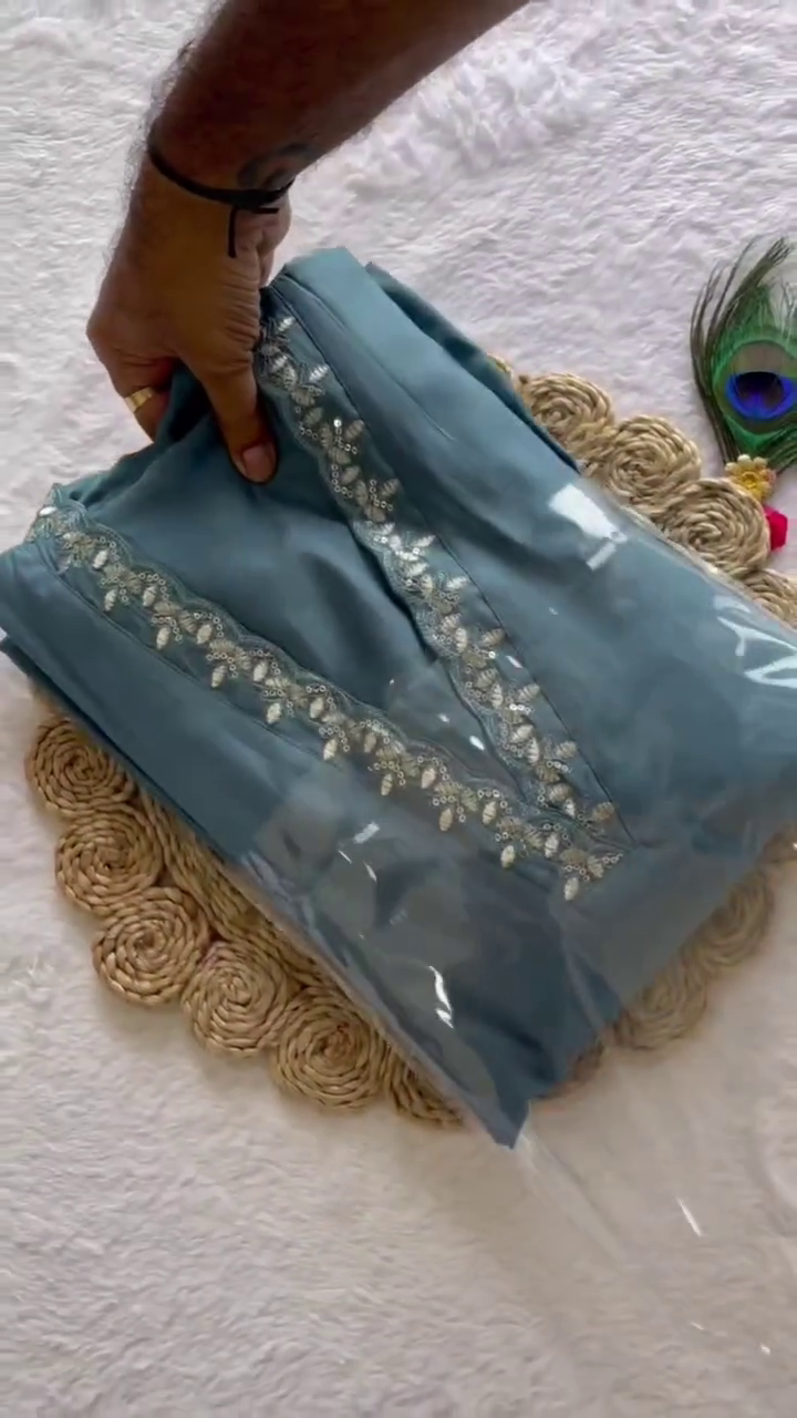 Elegant Dusty Teal Embroidered Kurti Set with Matching Pants and Net Dupatta – Subtle Ethnic Wear with Delicate Sequin Detailing for a Refined Look