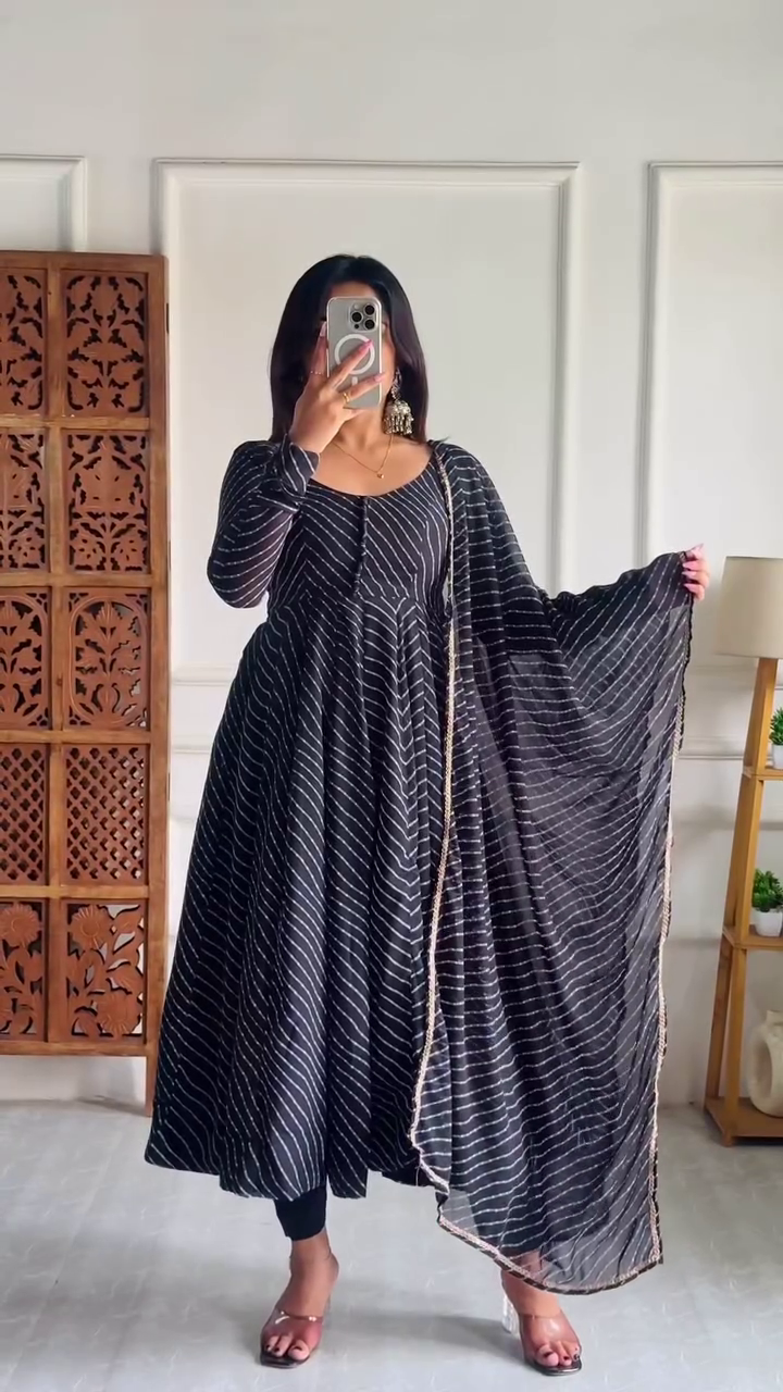 Chic Black Striped Anarkali with Elegant Sheer Dupatta and Gold Detailing