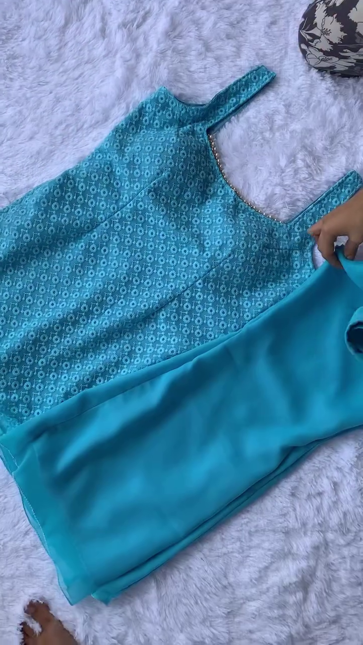 A vibrant combo of pink and turquoise outfits with delicate floral designs, paired with a classy pearl necklace. Perfect for a chic and fresh look!