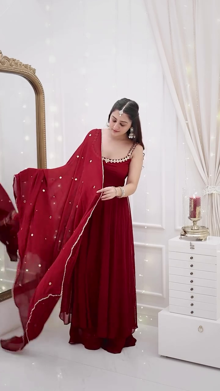Graceful Deep Maroon Georgette Anarkali Set with Mirror Lace Detailing and Matching Sheer Dupatta – Sleeveless Flowing Silhouette with Subtle Embellishments, Ideal for Sangeet Nights, Festive Soirées, and Elegant Evening Celebrations