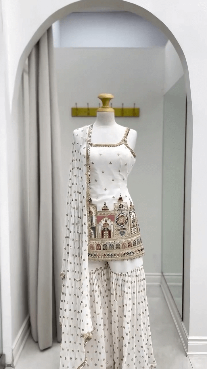 Elegant White Embroidered Anarkali Set with Architectural Motifs, Sheer Dupatta, and Flared Palazzo Pants