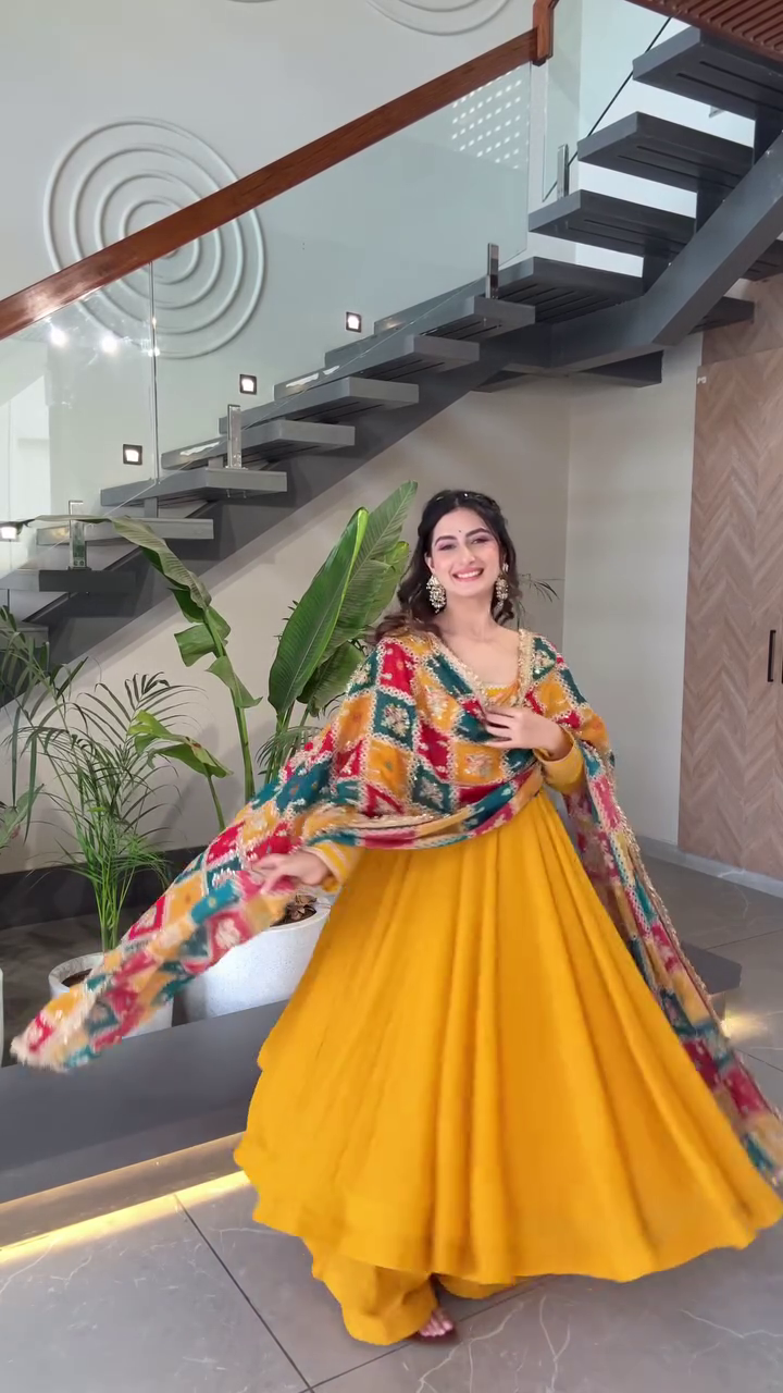 Bright Mustard Yellow Flared Anarkali Suit Set Paired with Multicolor Mirror-Work Bandhani Dupatta – Festive and Playful Ethnic Ensemble Featuring Gota Detailing and Flowing Silhouette