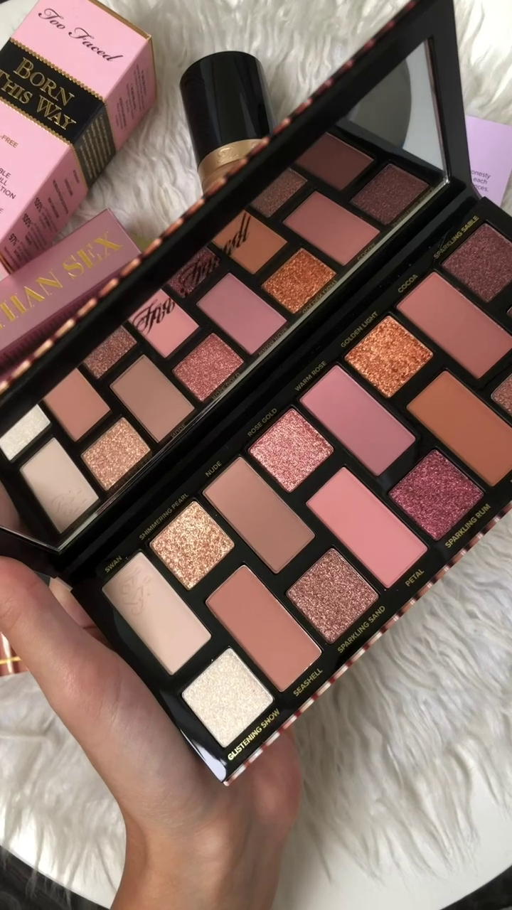 A stunning Too Faced eyeshadow palette featuring warm, shimmering shades like rose gold, golden light, and sparkling rum — perfect for creating a glamorous look!