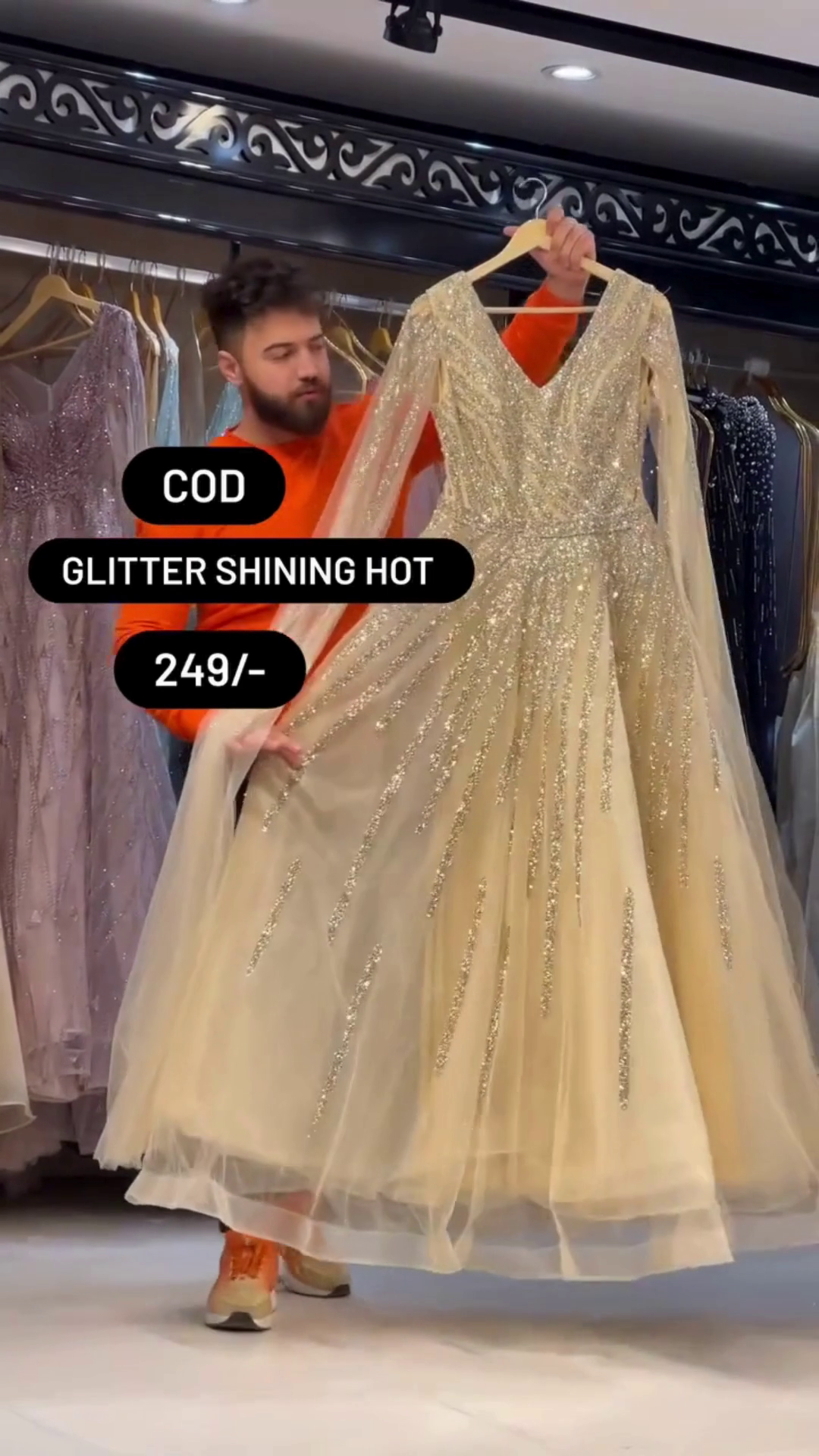 Luxurious Golden Glitter Gown All-Over Sequin Work, Deep V-Neckline, Full Sheer Sleeves, and Dramatic Flowing Flare – A Glamorous Imported Partywear Piece Perfect for Evening Events, Receptions, and Special Occasions