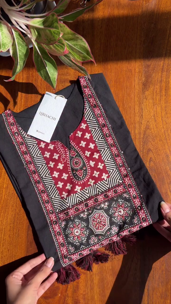 Black Cotton Kurta Set Intricately Embroidered Maroon and White Geometric Tassel Detailing, Matching Pants with Border Accents, and Complementing Printed Maroon Dupatta Traditional Paisley and Patterns – Perfect for Casual and Ethnic Wear
