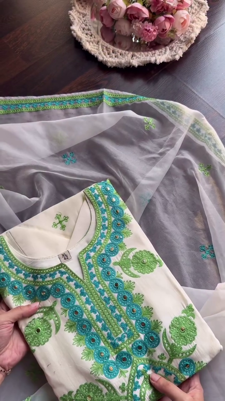 Off-White Cotton Kurta Set Featuring Intricate Green and Blue Thread Embroidery with Mirror Accents, Paired with a Coordinated Embroidered Dupatta and Matching Bottom – Perfect for Ethnic Festive and Summer Wear