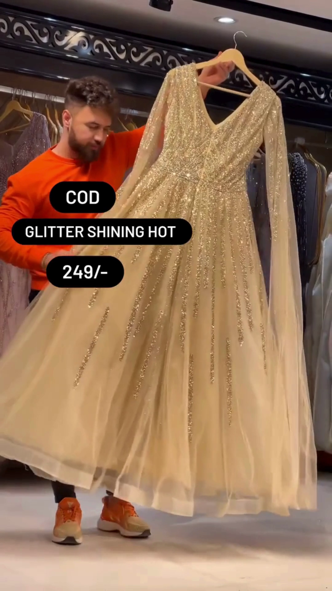 Luxurious Golden Glitter Gown All-Over Sequin Work, Deep V-Neckline, Full Sheer Sleeves, and Dramatic Flowing Flare – A Glamorous Imported Partywear Piece Perfect for Evening Events, Receptions, and Special Occasions