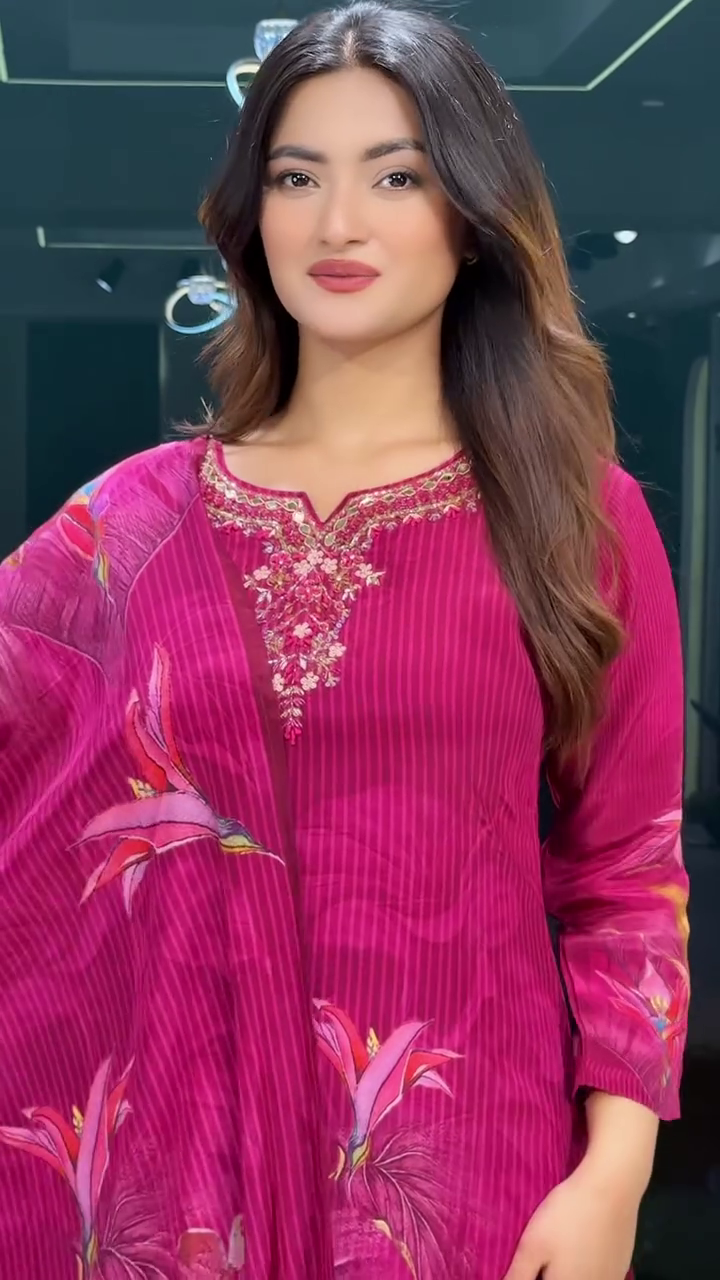 Magenta Floral Printed Kurta Set Featuring Intricate Neck Embroidery, Vertical Stripe Detailing, Coordinated Straight Pants, and Flowing Dupatta with Bold Botanical Motifs – Perfect for Festive and Ethnic Occasions