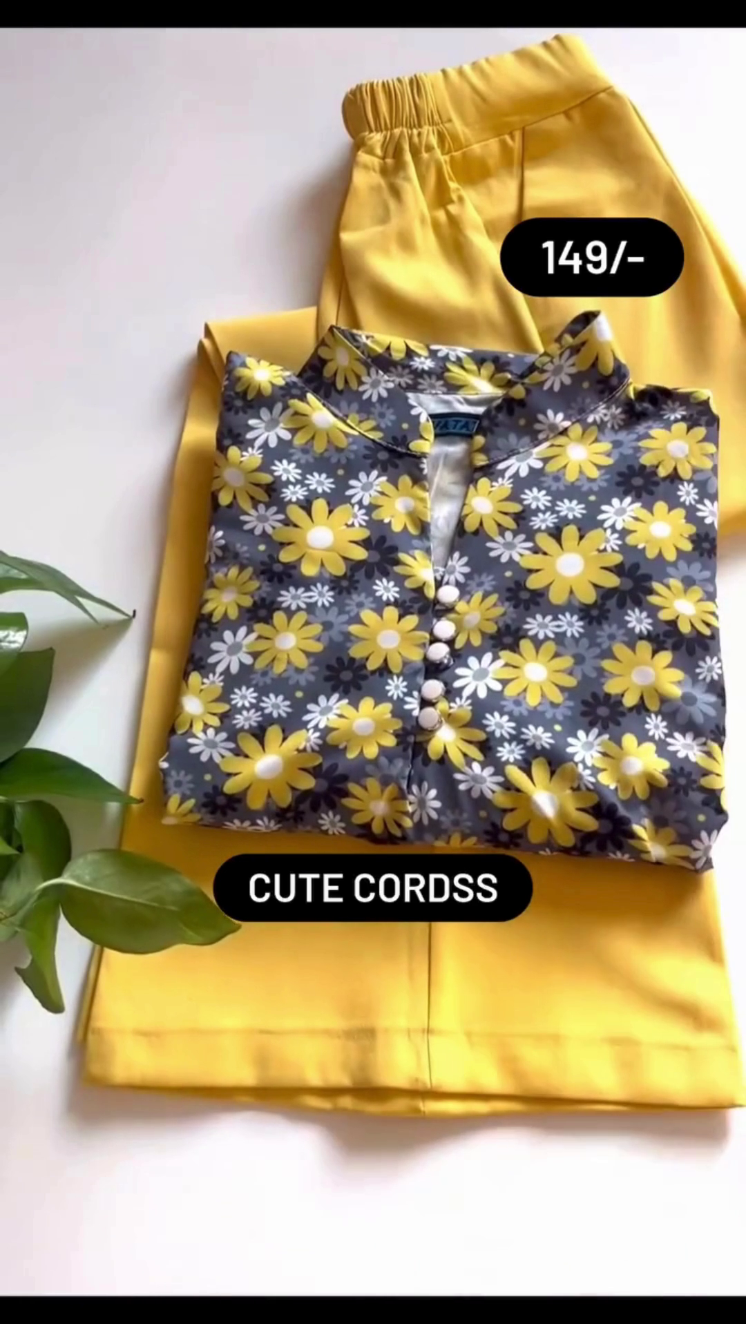 Charming Floral Printed Co-Ord Set Featuring Button-Down Top with Vibrant Daisy Motifs on a Dark Base, Paired with Solid Elastic-Waist Pants in Soft Pastel Shades – Available in Multiple Color Variants, Ideal for Everyday Wear and Comfortable Home Style