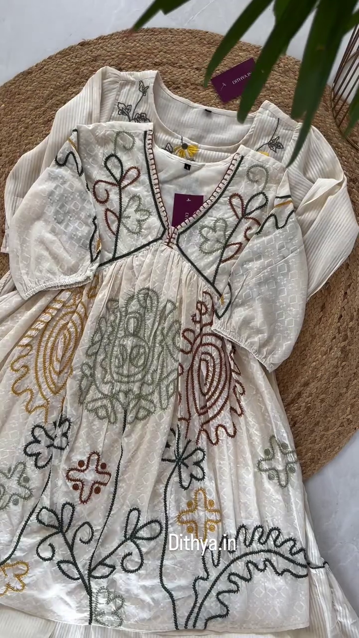 Off-White Hand-Embroidered Cotton A-Line Dress with Multicolor Floral Threadwork and Puff Sleeves – Comfortable Ethnic Wear for Girls