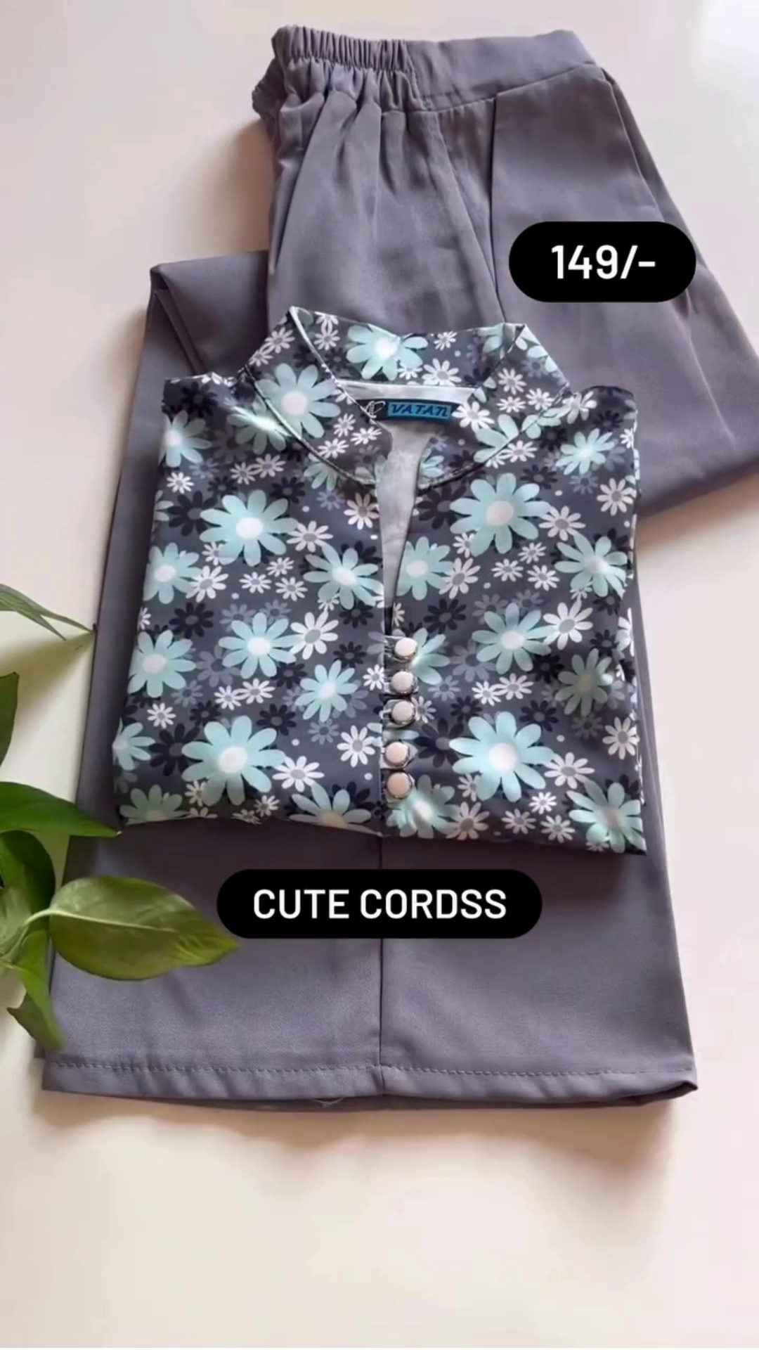Charming Floral Printed Co-Ord Set Featuring Button-Down Top with Vibrant Daisy Motifs on a Dark Base, Paired with Solid Elastic-Waist Pants in Soft Pastel Shades – Available in Multiple Color Variants, Ideal for Everyday Wear and Comfortable Home Style