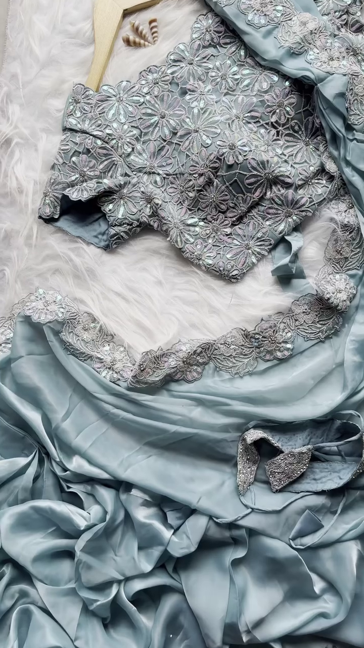 Pastel Blue Satin Saree with Sequin Floral Embroidered Blouse and Lace Border Detailing – Perfect for Wedding, Party, or Festive Occasions