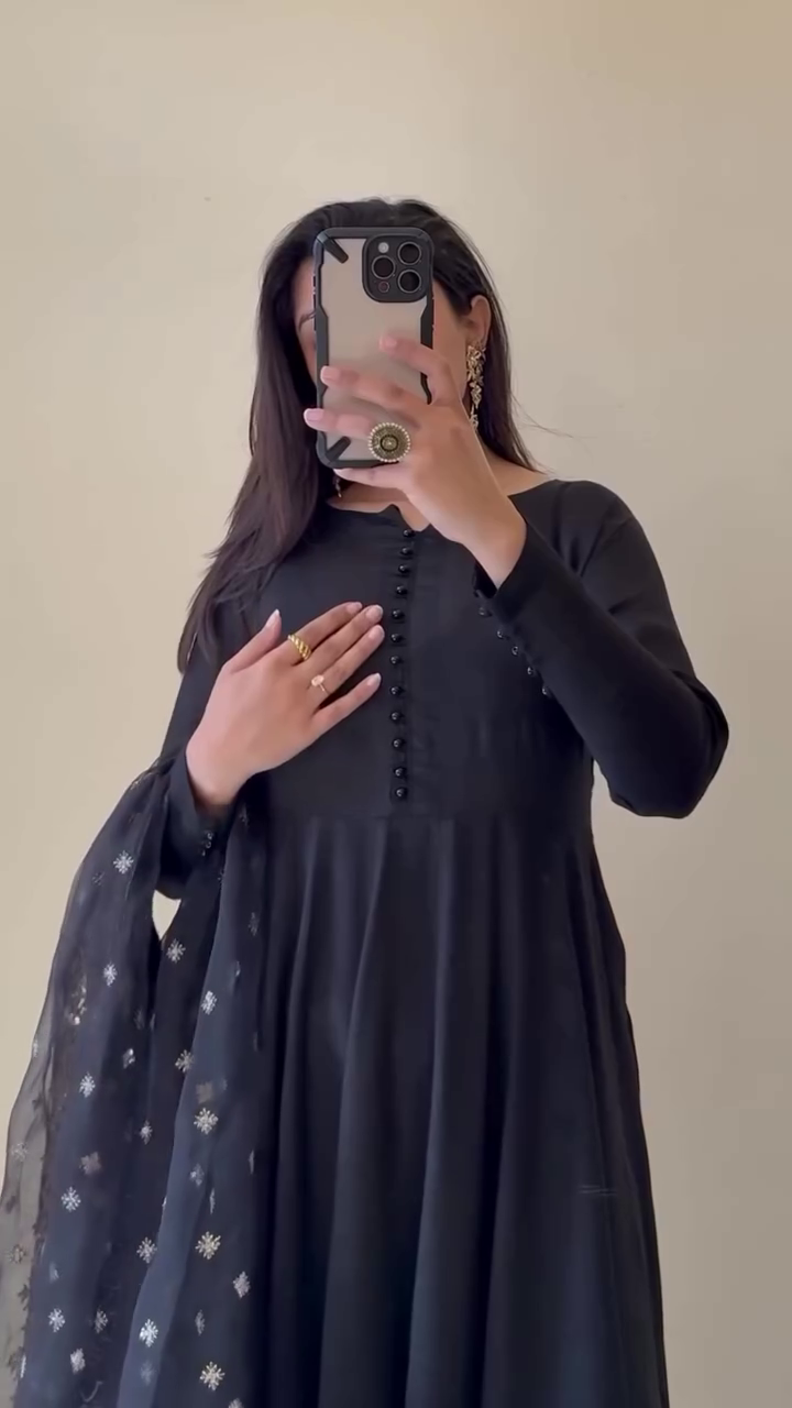 Black Anarkali Suit Set Featuring Flared Silhouette with Matching Wide-Leg Bottoms, Paired with Sheer Embroidered Dupatta Accentuated with Intricate Golden Threadwork and Border Detailing – Perfect for Festive and Traditional Occasions