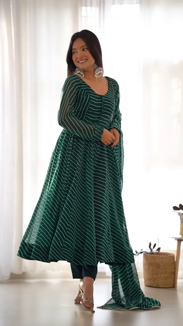 Elegant Green Bandhani Print Anarkali Kurta Set with Matching Dupatta and Solid Pants – Flowy Flared Design, Button Detailing, Full Sleeves, and Ethnic Chic Look – Perfect for Festive, Wedding, and Party Wear