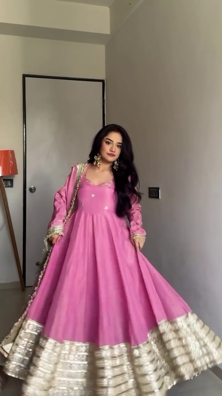 Baby Pink Flared Anarkali Suit Set Featuring Intricate Golden Embroidered Border, Delicate Sequin Detailing, Matching Dupatta with Embellished Edges, and Full Sleeves – Perfect for Festive Celebrations and Traditional Occasions