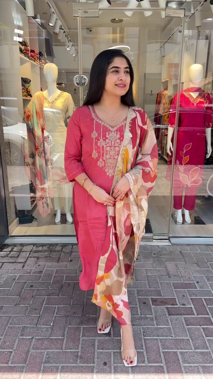 Graceful Coral Pink Suit Set with Delicate Golden Thread Embroidery and a Bold Multicolor Floral Printed Dupatta – A Perfect Blend of Elegance and Vibrance for Festive and Daytime Occasions
