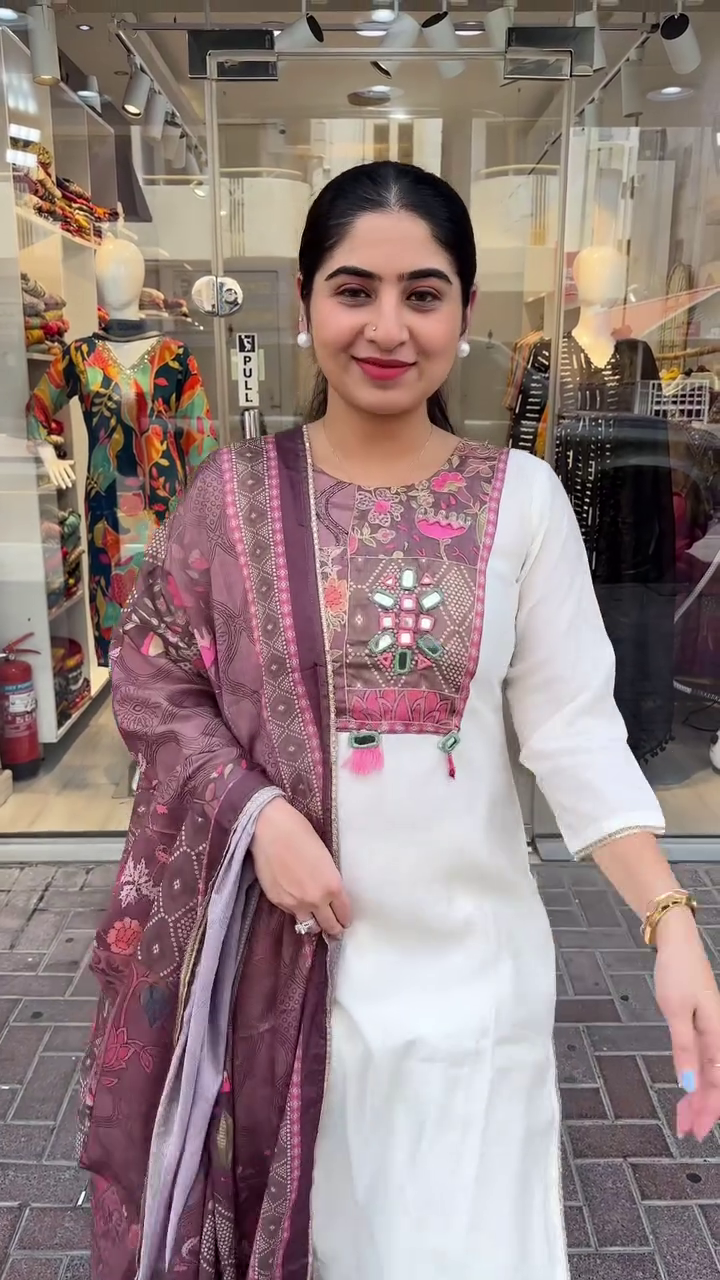 Chic Cream Suit Set Featuring Vibrant Multicolor Thread Embroidery on the Yoke Paired with a Rich Printed Silk Dupatta – A Perfect Fusion of Modern Grace and Traditional Artistry