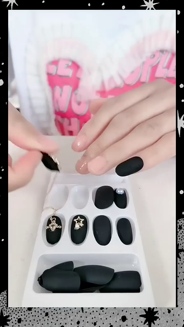 Black Matte Press-On Nails with Stylish Star and Heart Charm Accessories for Trendy and Glamorous Manicures